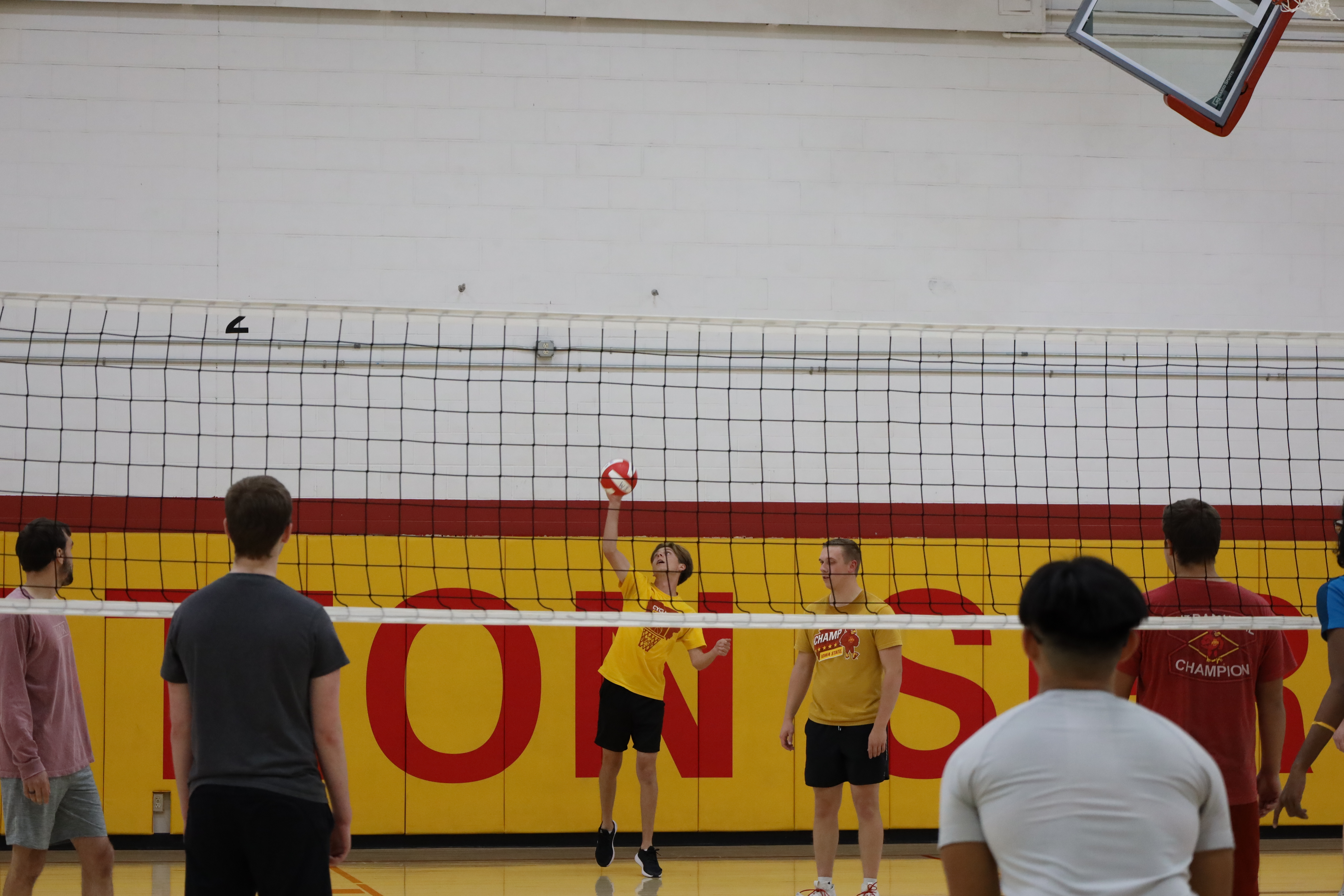 a photo of students playing volleyball at beyer hall