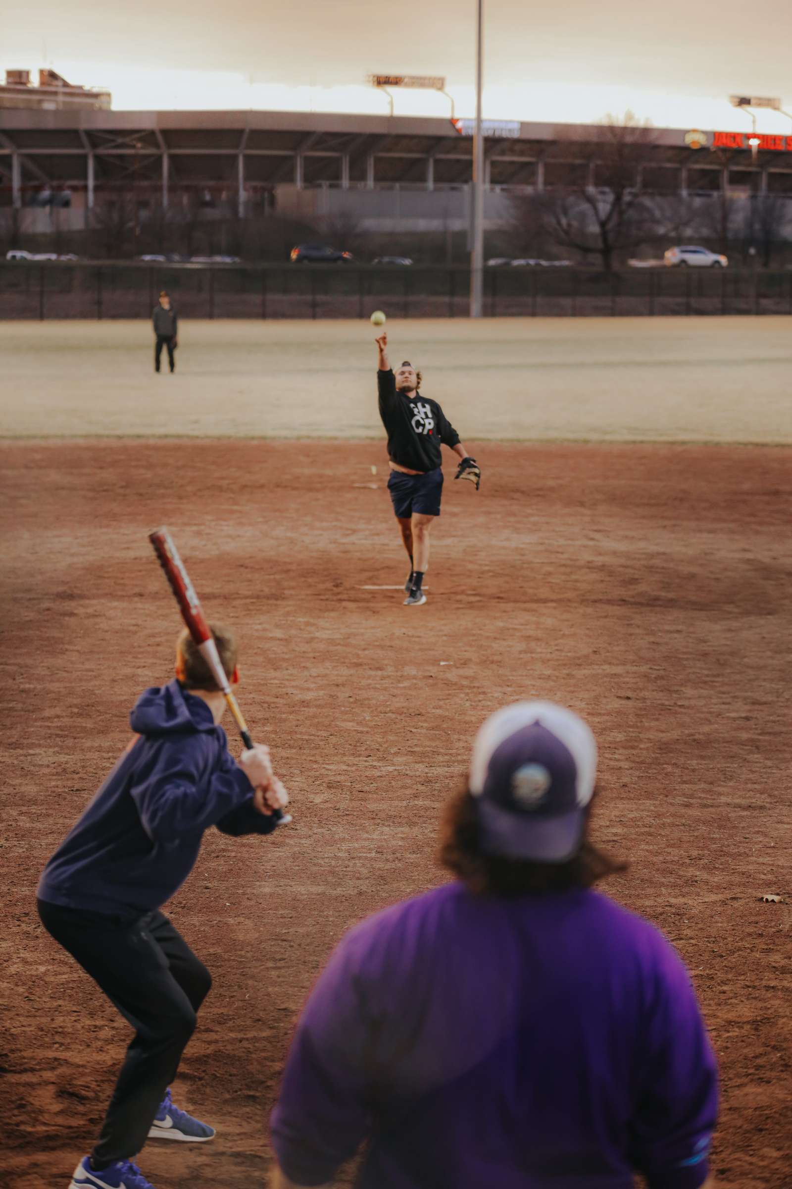 Photo of the students playing baseball