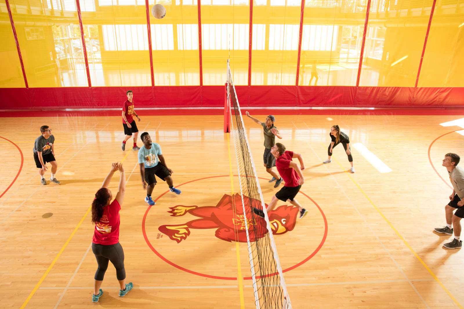 photo of facility members playing volleyball