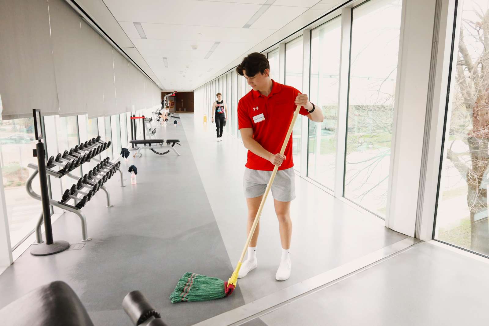 a photo of the cleaning attendant at the skywalk